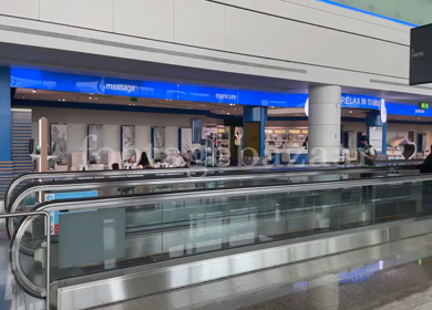 A Pan Shot of People at DXB Terminal 1, Dubai Airport,UAE 