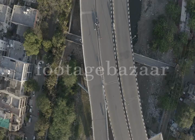 An aerial shot of Empty Road and People at New Delhi,India