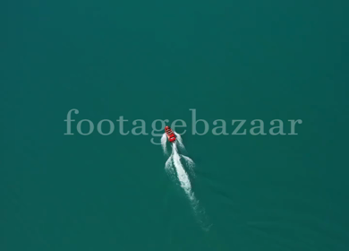 An aerial shot of amotor boat in the Lake Interlaken in Switzerland