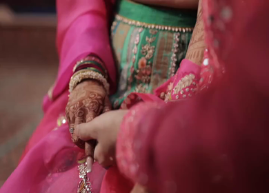 A Slow motion shot of a Indian Groom and Indian Bride posing towards camera at their Indian wedding in India
