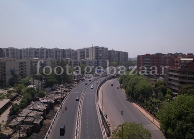 An aerial shot of the Traffic at Barah Pulla flyover in New Delhi, India 