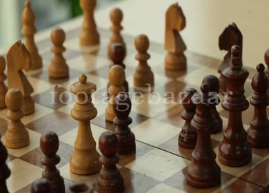 Shot of Indian colleagues playing chess 